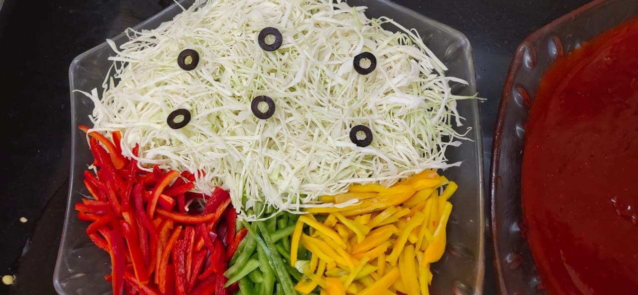A colorful display of salads and appetizers.